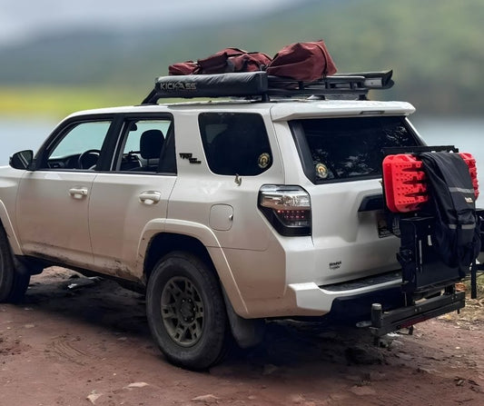 SUV equipped with a hitch-mounted cargo carrier to expand storage space