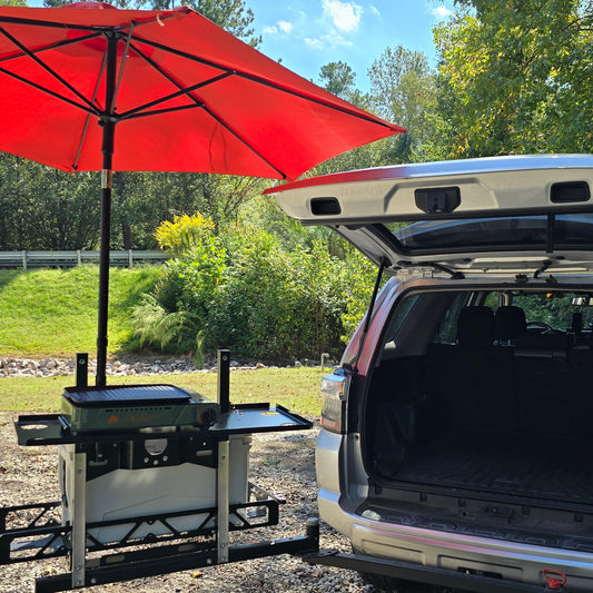 gunny hitch-mounted swing arm cargo system swung open on back of suv