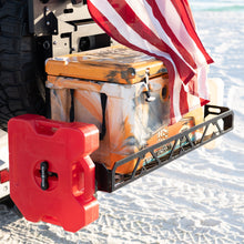 Jeep cargo rack and Jeep Wrangler cargo carrier with RotopaX fuel mounts carrying cooler on beach